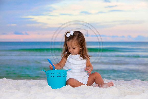 girl with bucket on beach pics