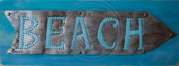 Beach word in Arrow shape tin punched