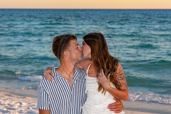 Couple Poses for Beach Pictures