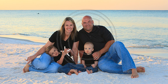 Family at sunrise Gulf place fl