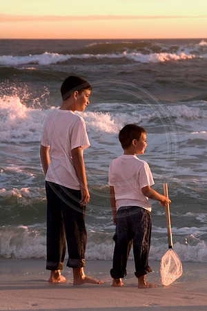 brothers at sunset candid beach pic
